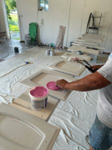kitchen cabinet doors being prepped for a painting project